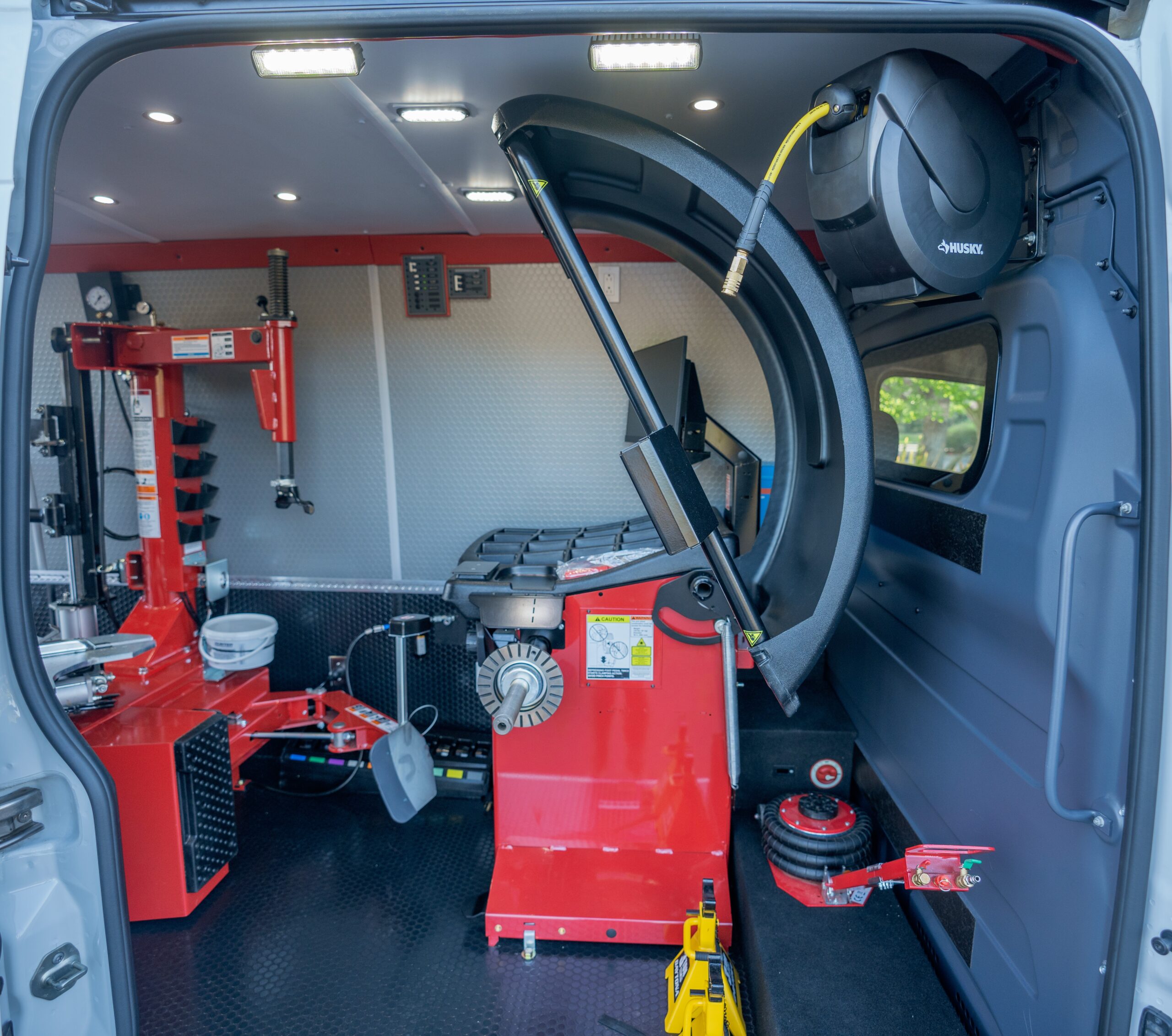 Mobile tire shop van interior with repair tools